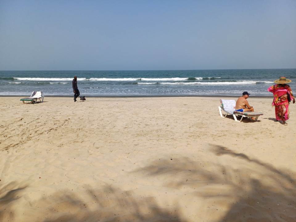 Beach scene with people relaxing